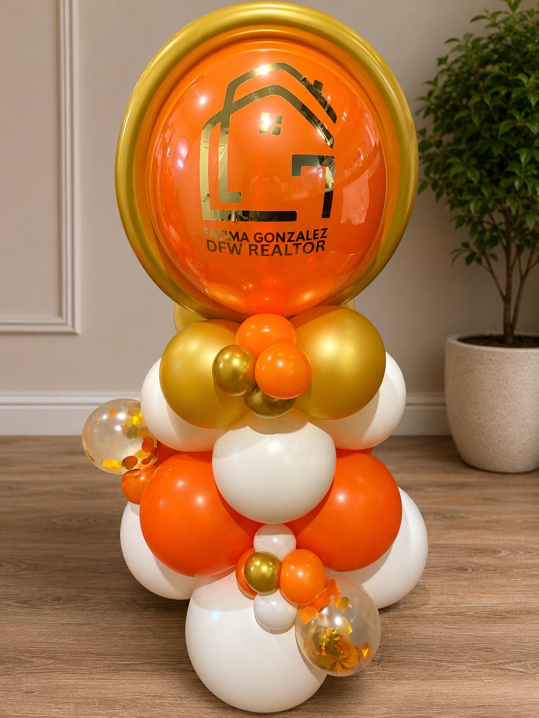 Orange balloon column topped with a custom printed logo balloon