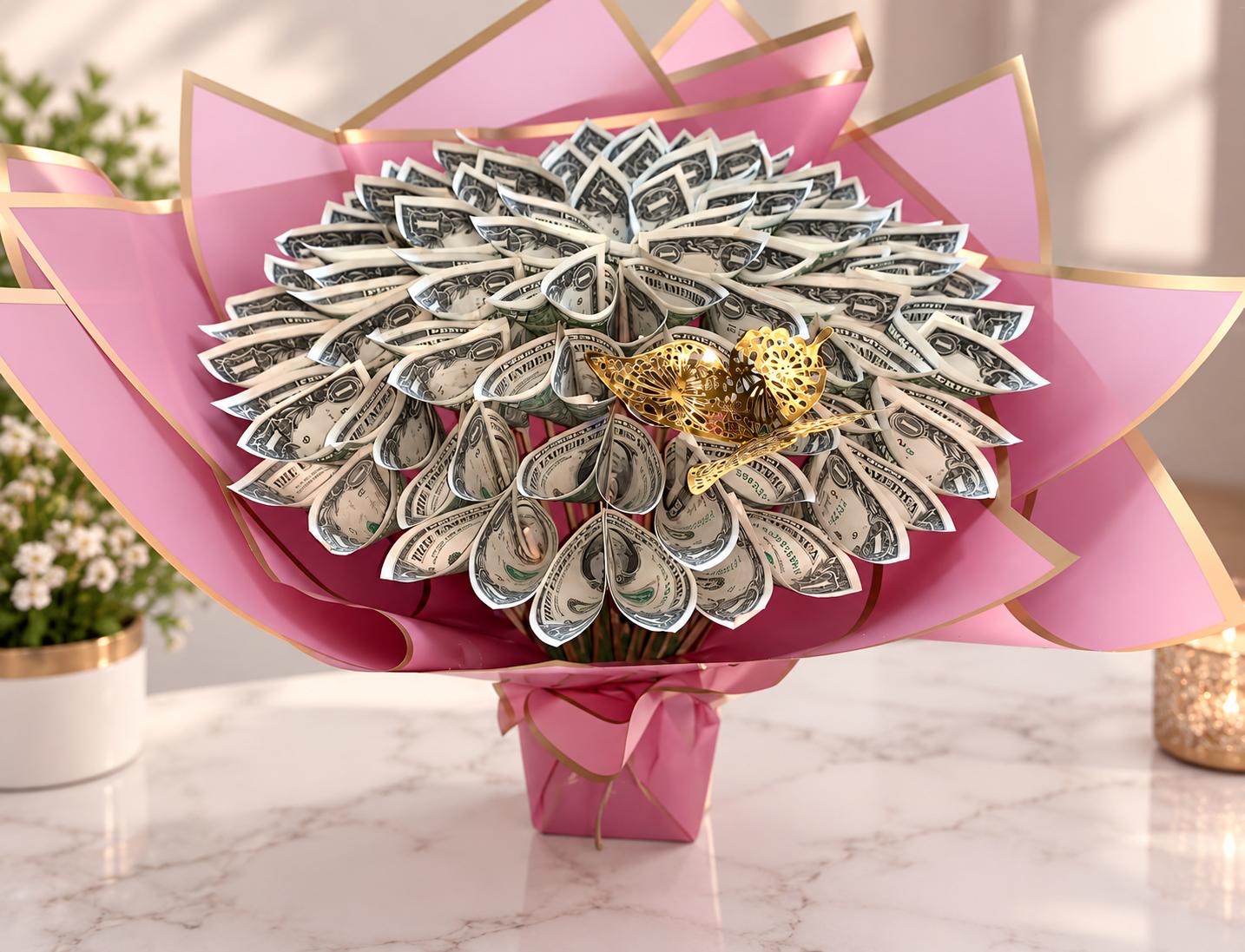Folded money fan in pink wrapping with a gold crown center